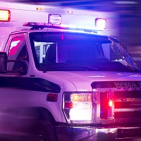 Ambulance with flashing lights.