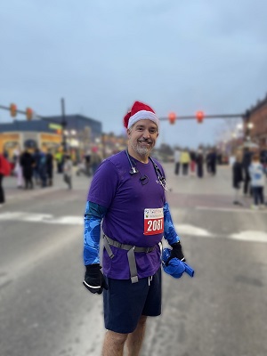 Dr. Matthew Moore at the Merry Mile race in Saline, Dec. 2023